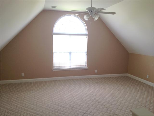 719 Heritage Road Lebanon, TN 37087 - Photo 5 of 6 an empty room with a window