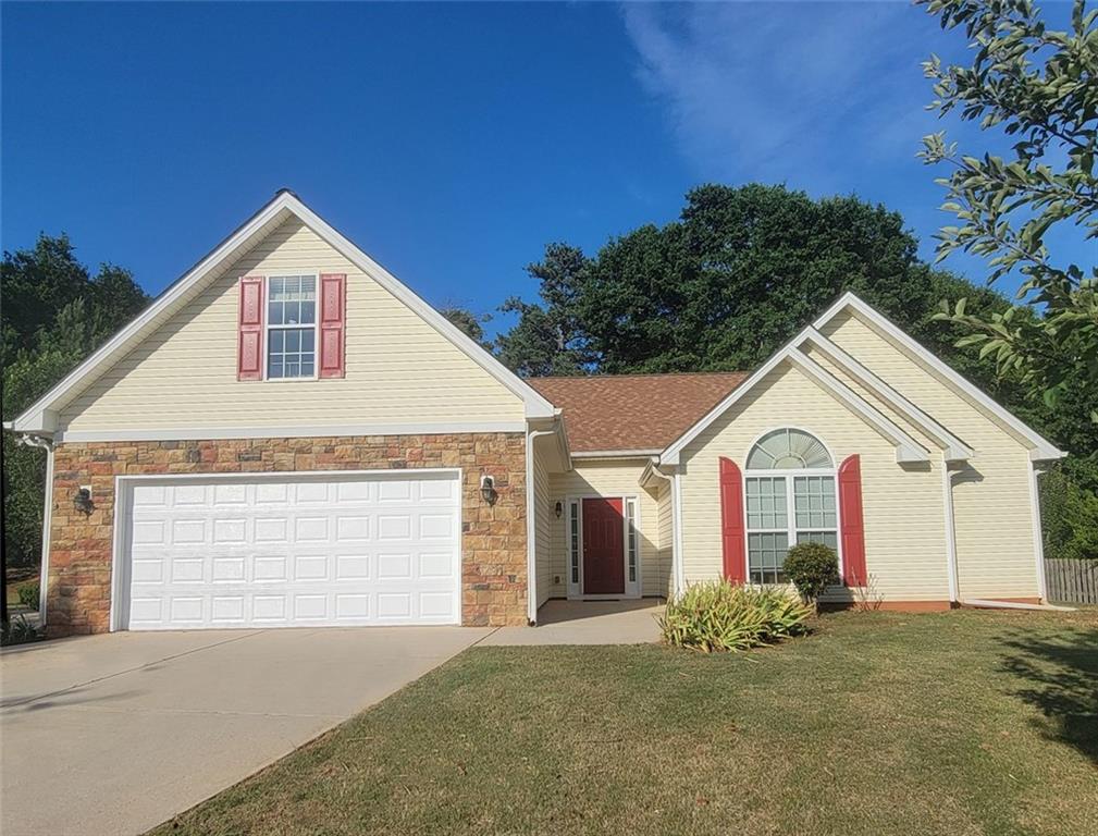 161 Celestial Run Winder, GA 30680 - Photo 1 of 1 a view of a house with a yard and garage