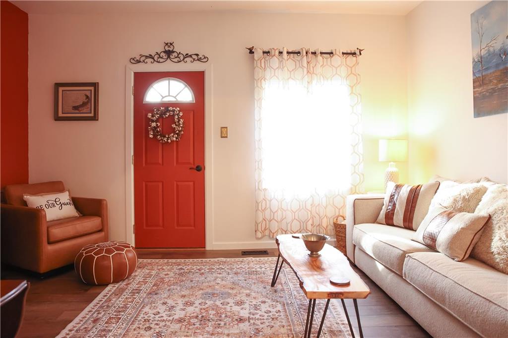 1021 Leesburg Station Road Mercer, PA 16137 - Photo 12 of 45 a living room with furniture and a rug