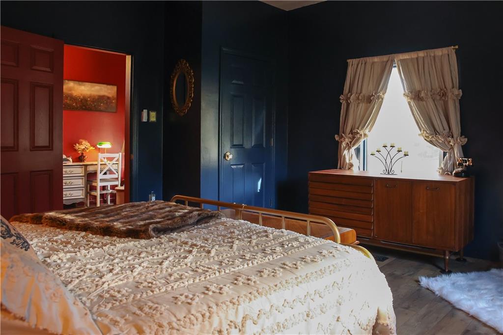 1021 Leesburg Station Road Mercer, PA 16137 - Photo 16 of 45 a bedroom with a bed and a dresser