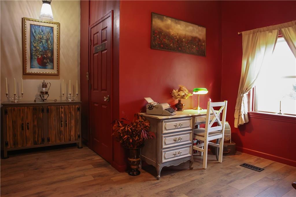 1021 Leesburg Station Road Mercer, PA 16137 - Photo 18 of 45 a bed room with a bed and a dresser