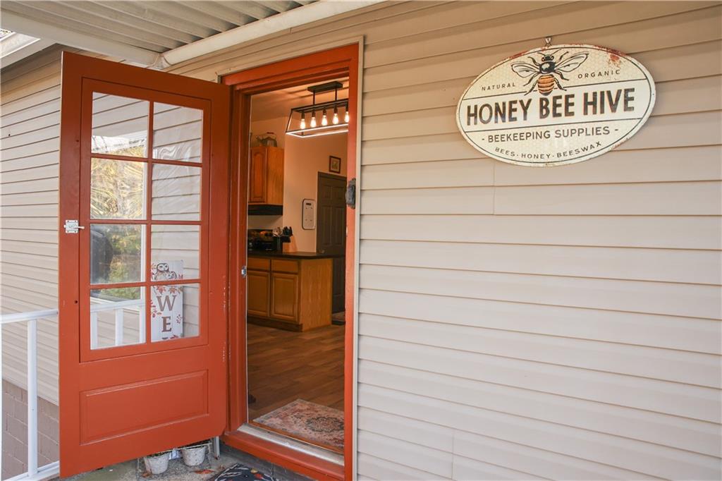 1021 Leesburg Station Road Mercer, PA 16137 - Photo 4 of 45 a close up of a sign