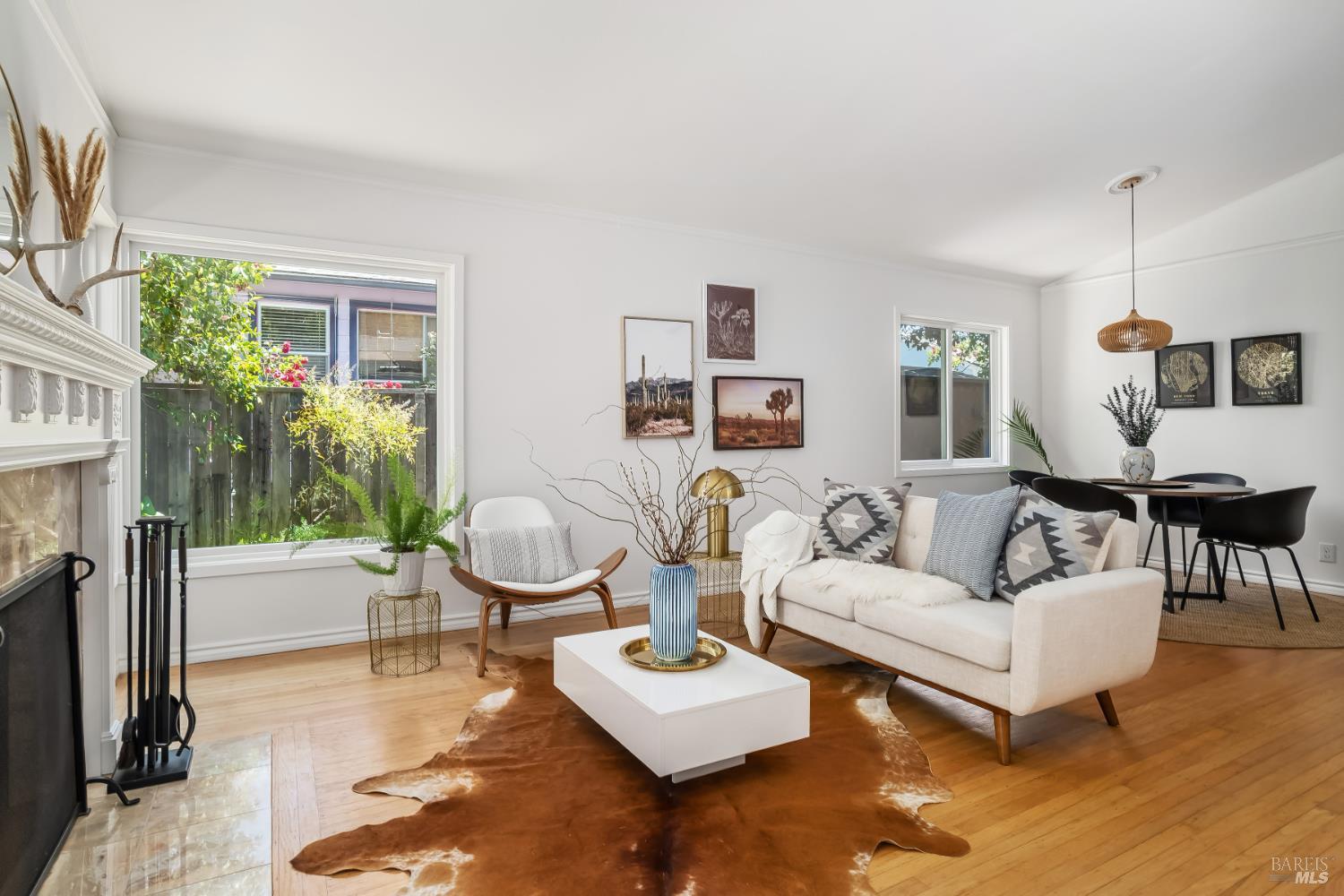 35 Olema Road Fairfax, CA 94930 - Photo 1 of 1 a living room with furniture a fireplace and a table