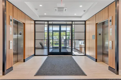 a view of hallway with a large window