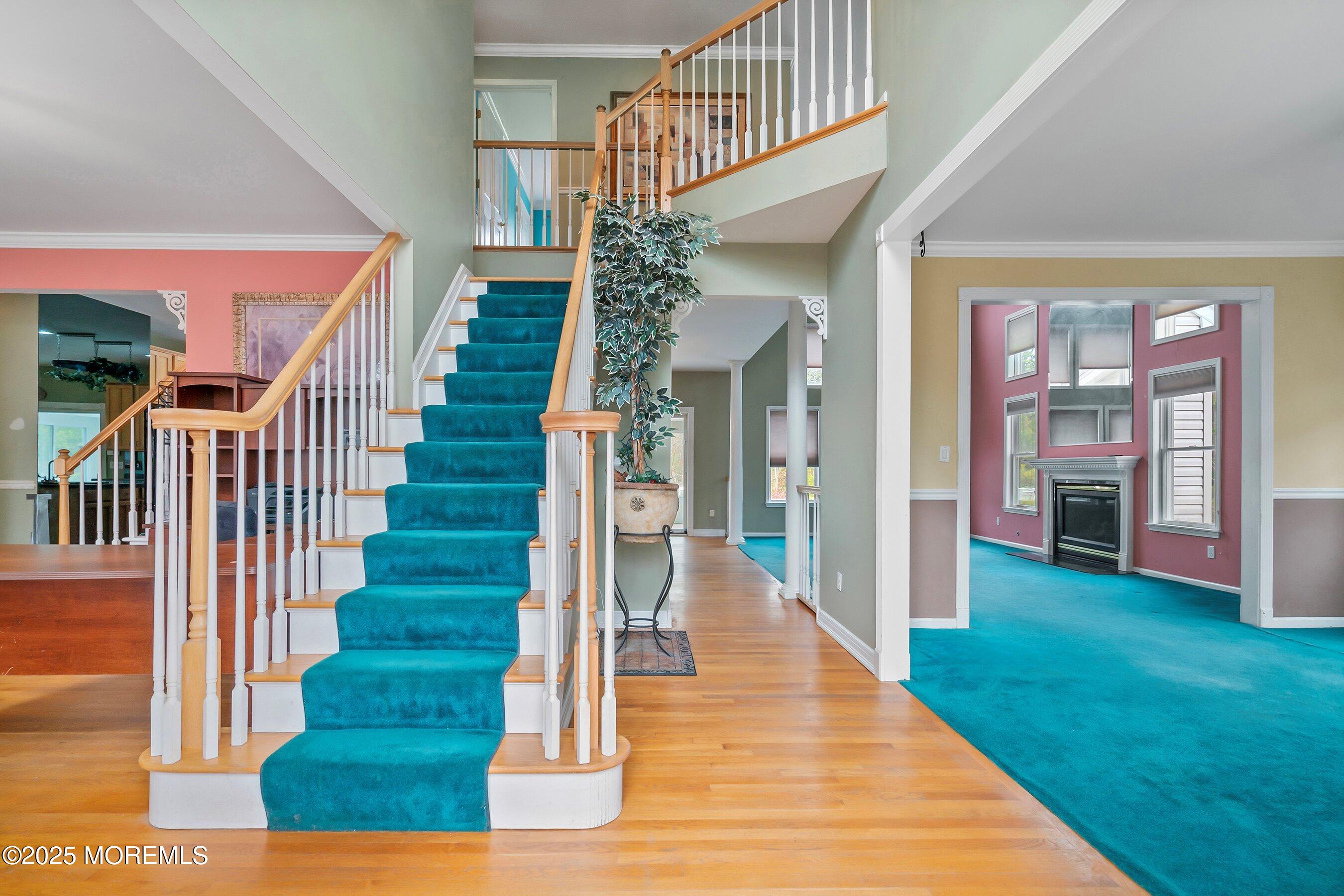 9 Ranch Boulevard Manahawkin, NJ 08050 - Photo 12 of 55 a view of entryway and hall with wooden floor