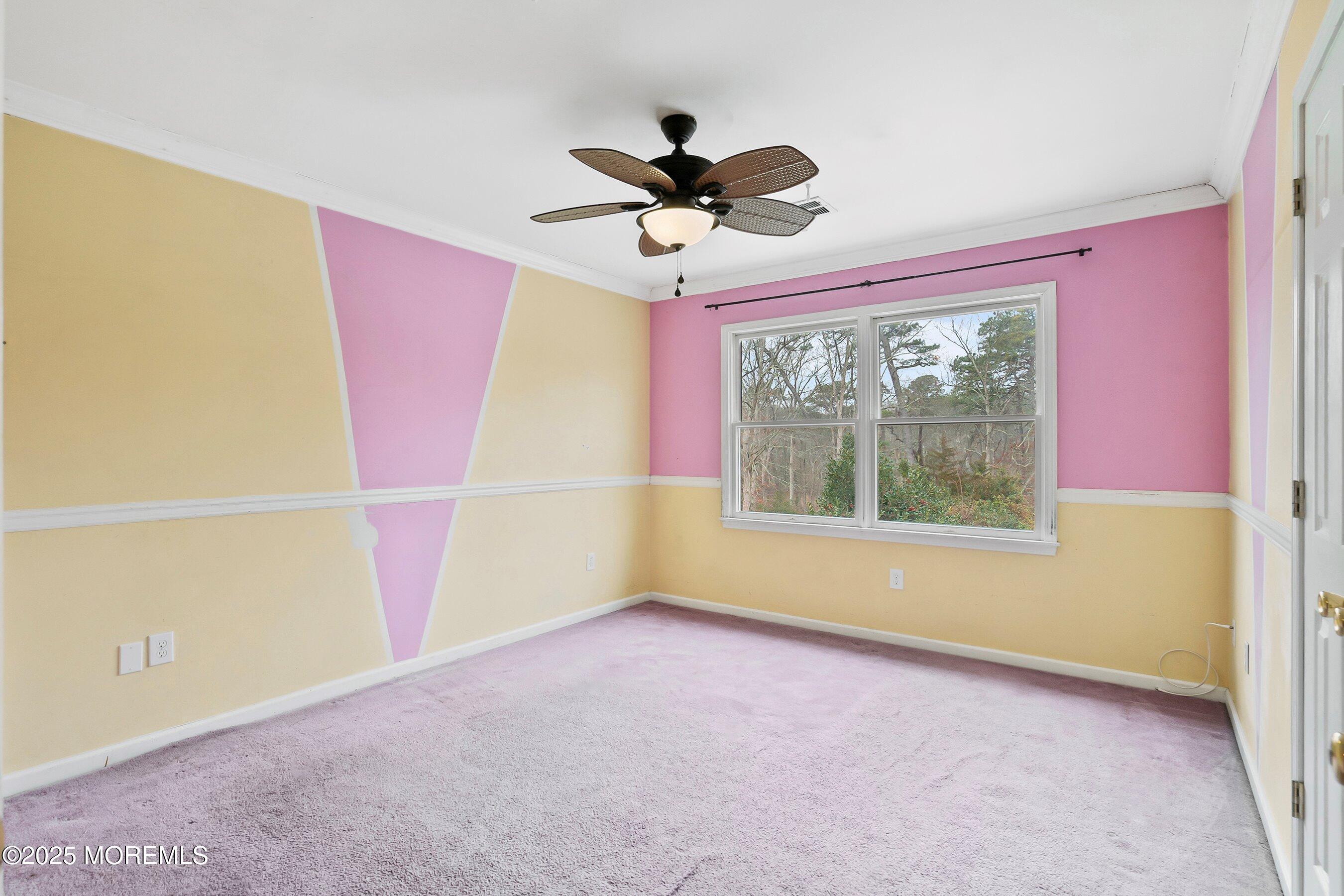 9 Ranch Boulevard Manahawkin, NJ 08050 - Photo 41 of 55 a view of a livingroom with a ceiling fan and window