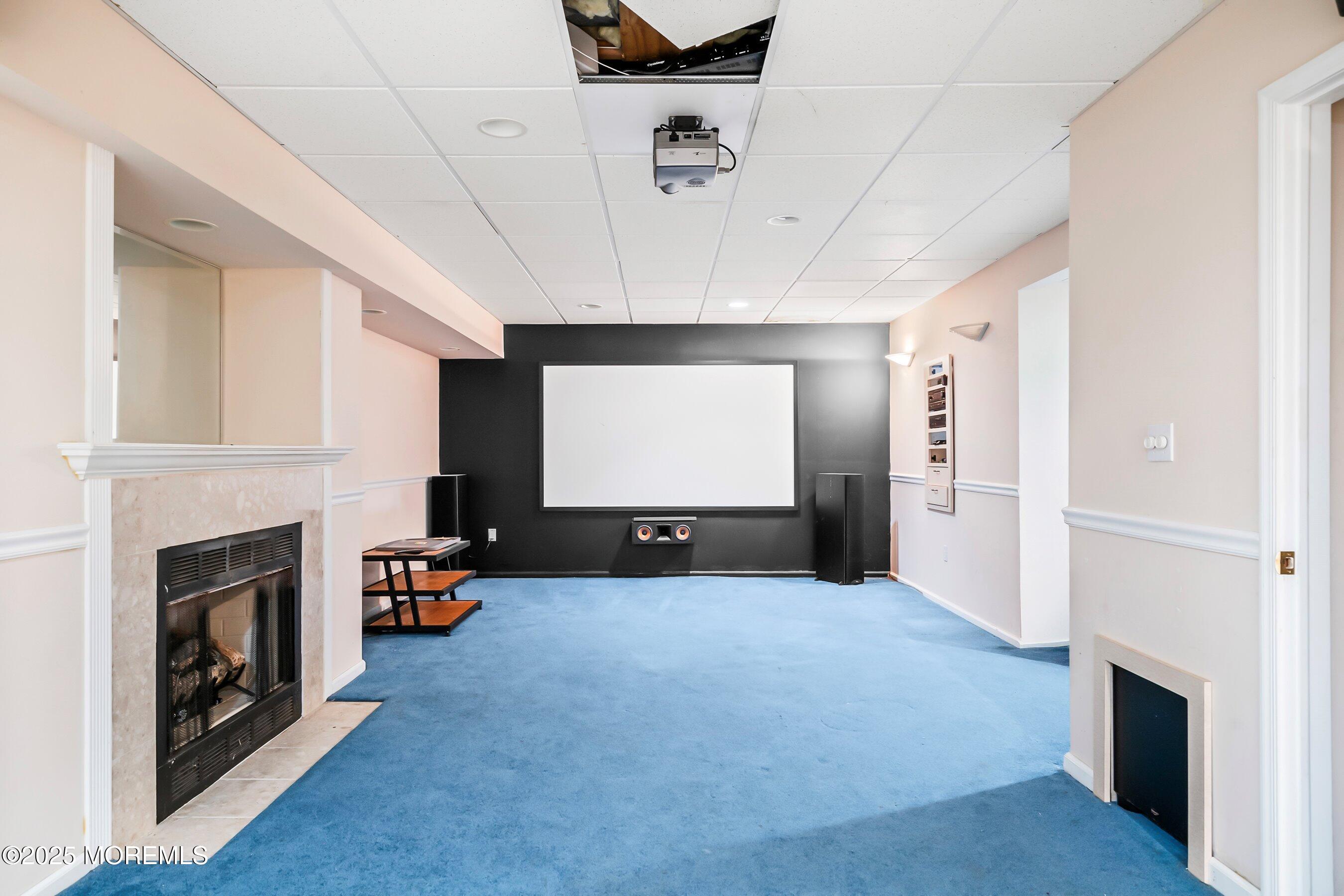 9 Ranch Boulevard Manahawkin, NJ 08050 - Photo 50 of 55 a view of a livingroom with a fireplace and window