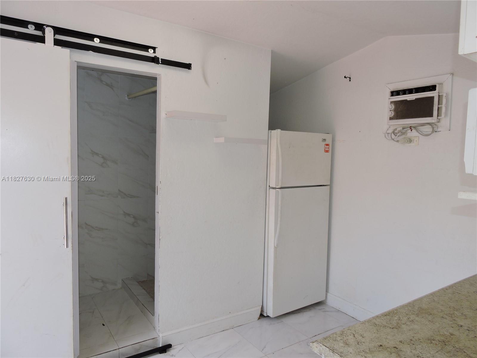 525 East 24th Street, Unit 4 Hialeah, FL 33013 - Photo 11 of 17 a view of bathroom