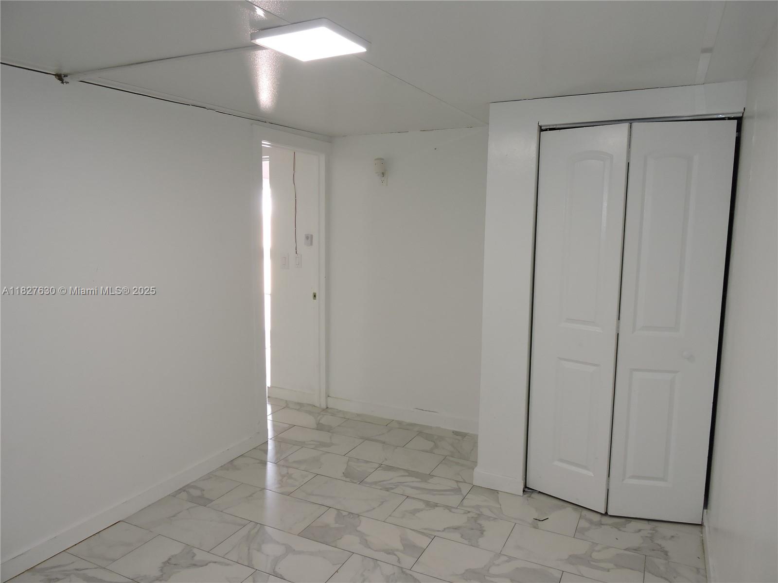 525 East 24th Street, Unit 4 Hialeah, FL 33013 - Photo 14 of 17 a view of an empty room