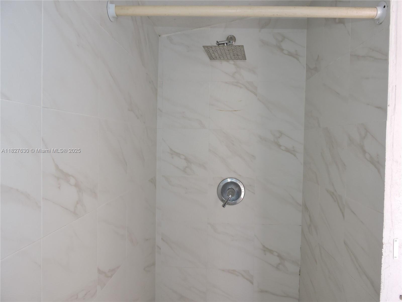 525 East 24th Street, Unit 4 Hialeah, FL 33013 - Photo 7 of 17 a bathroom with a shower
