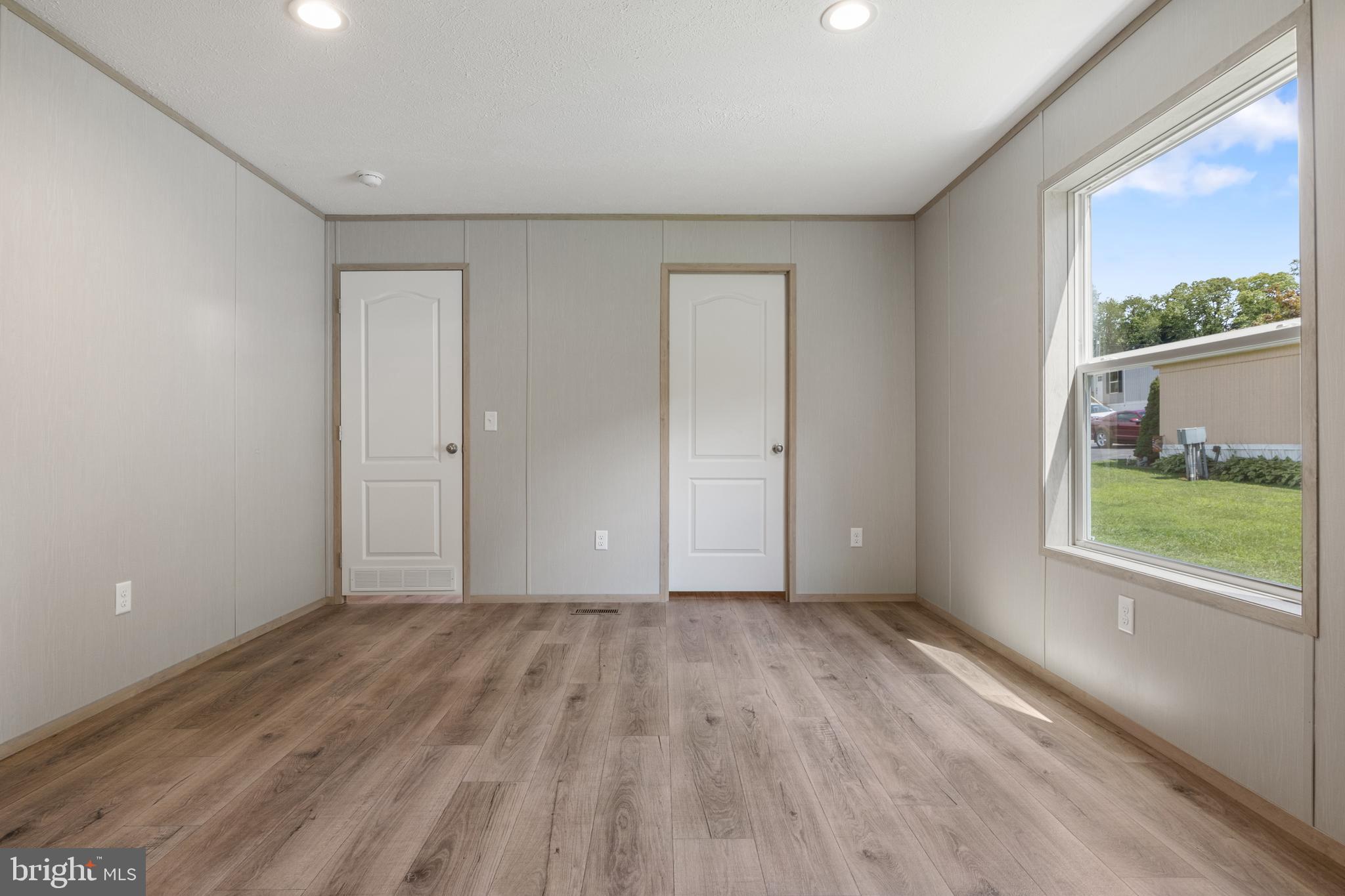 31 Mill Street York, PA 17406 - Photo 14 of 19 wooden floor in an empty room with a window
