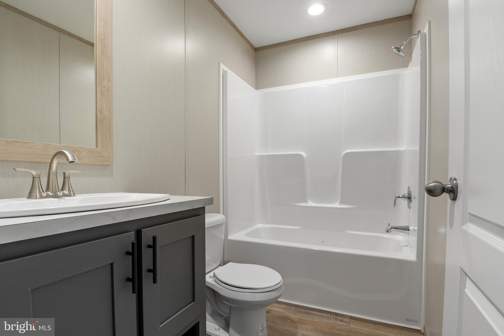 31 Mill Street York, PA 17406 - Photo 8 of 19 a bathroom with a sink a toilet and shower