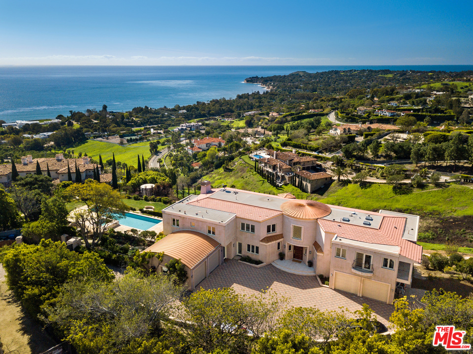 27445 Winding Way Malibu, CA 90265 - Photo 5 of 51 an aerial view of a house with a garden
