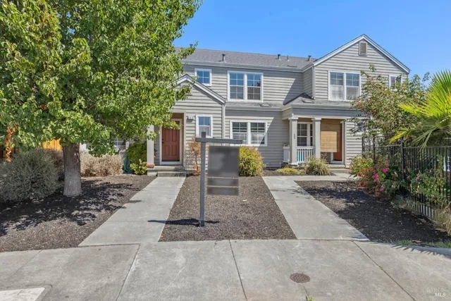 a bathroom with a sink toilet and a mirror