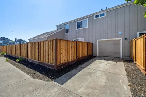 a view of a back yard of the house