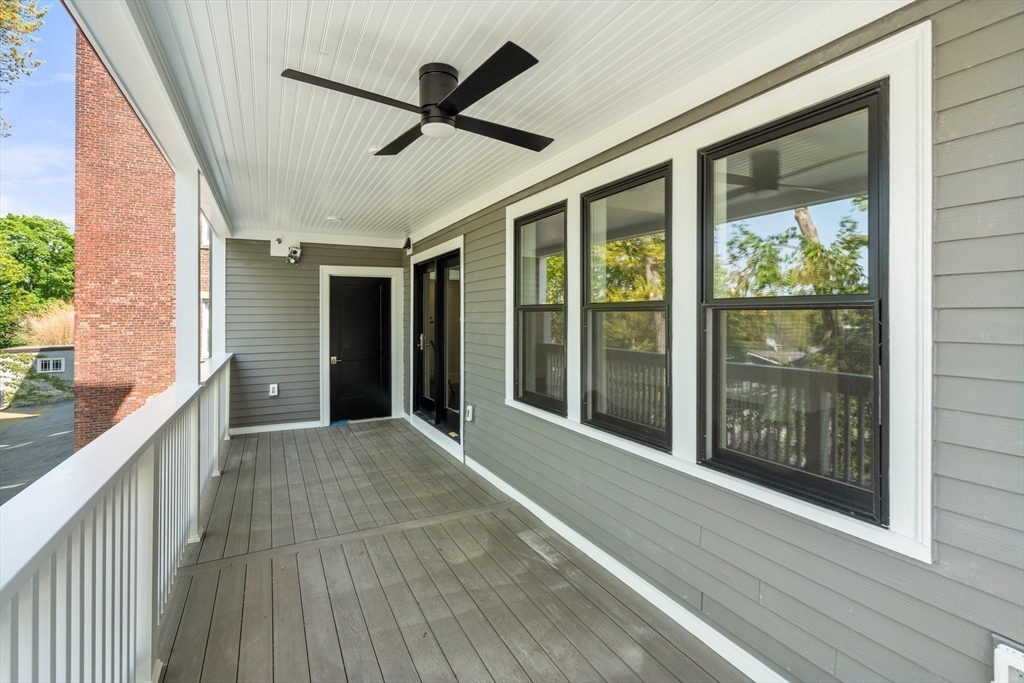 111 Winthrop Road, Unit 2 Brookline, MA 02445 - Photo 10 of 12 a view of outdoor space with wooden floor and windows