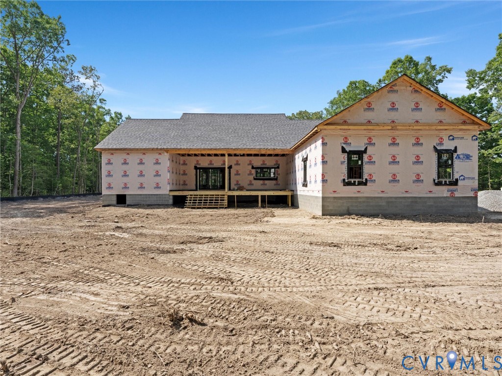 13216 Bradley Bridge Road Chester, VA 23831 - Photo 5 of 12 a front view of a house with a yard