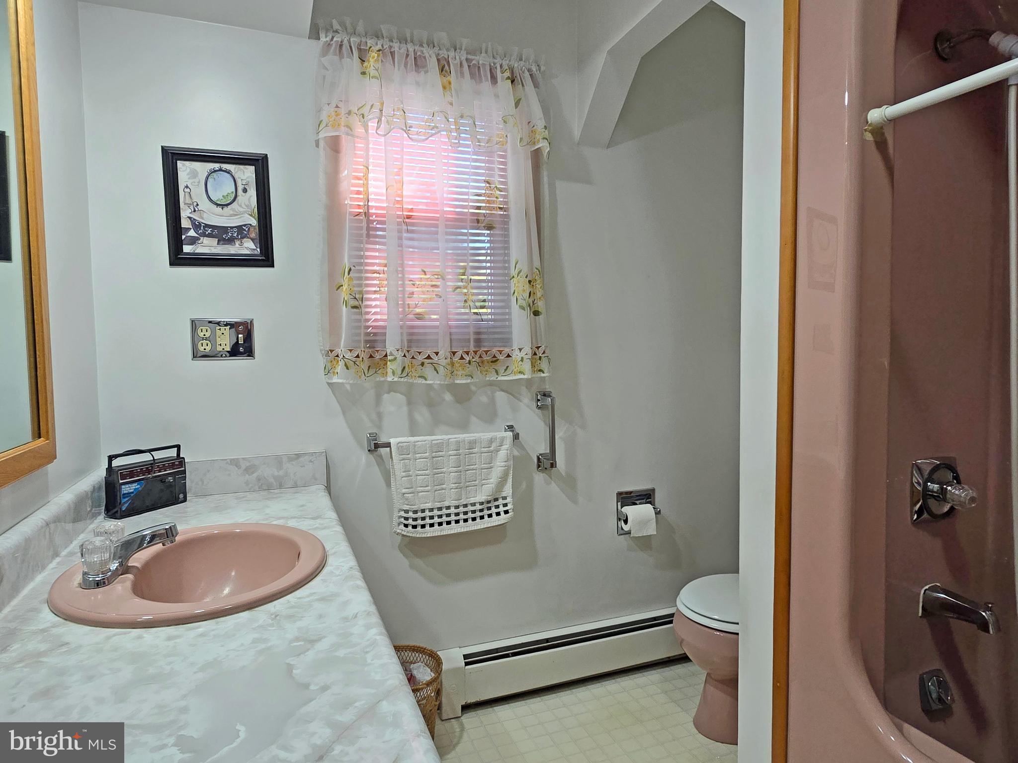 162 Avilton Road Lonaconing, MD 21539 - Photo 20 of 49 a bathroom with a toilet a sink and mirror