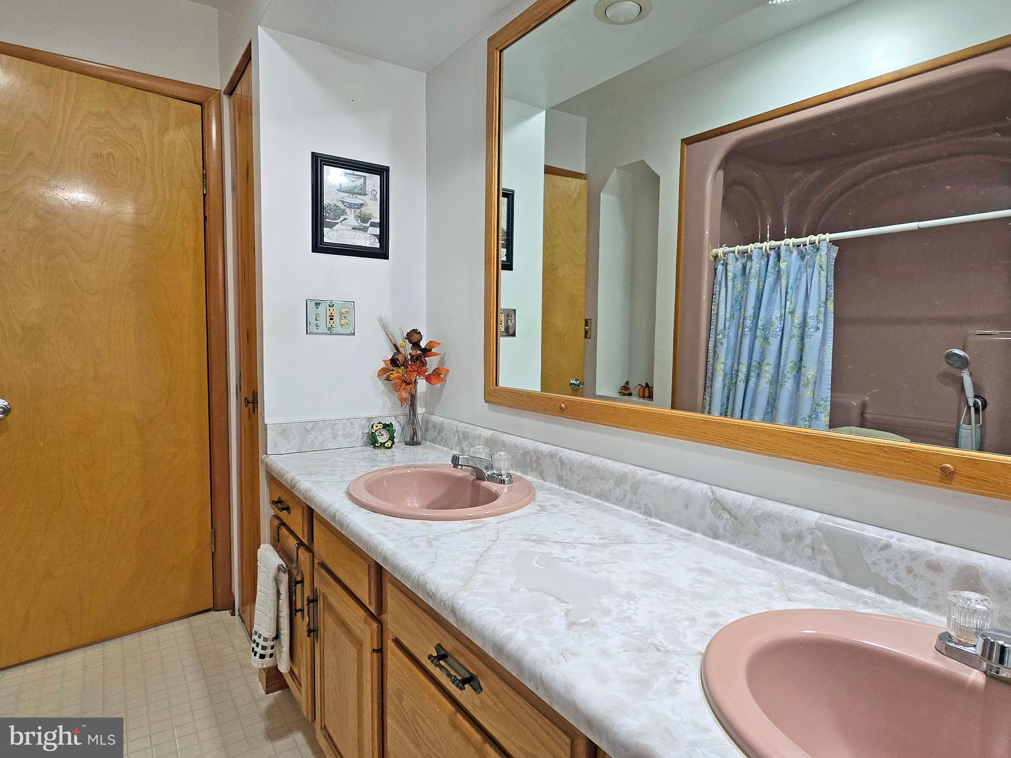 162 Avilton Road Lonaconing, MD 21539 - Photo 21 of 49 a bathroom with a granite countertop sink and a mirror