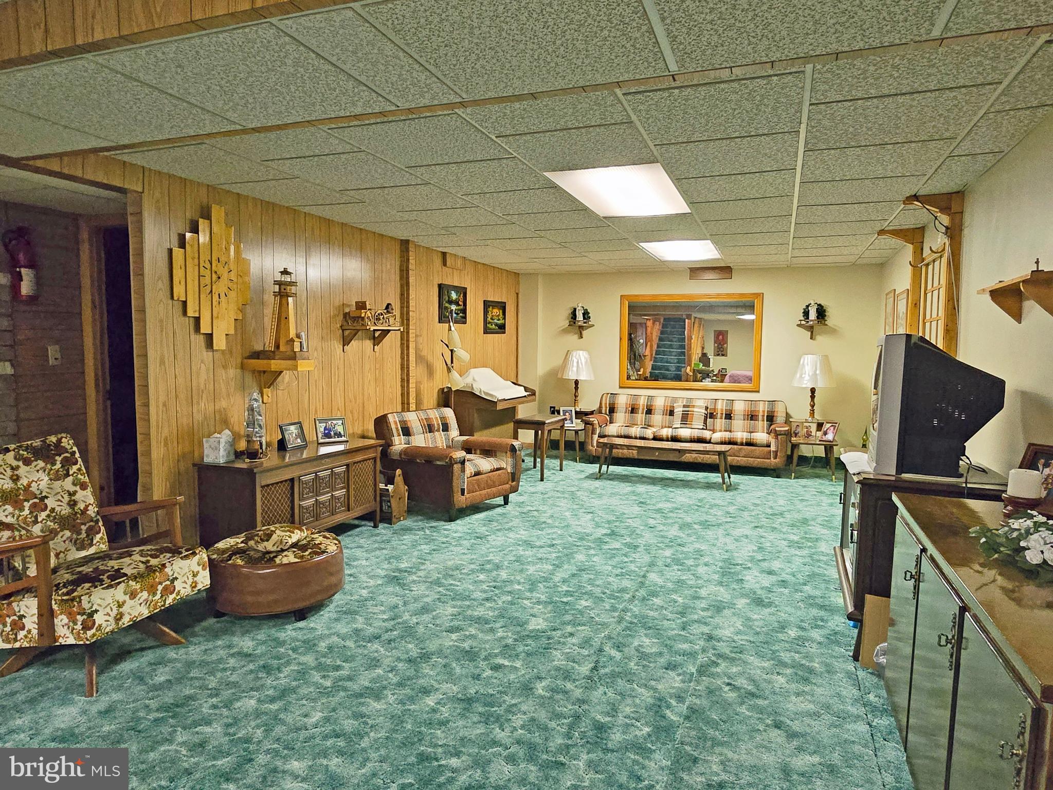 162 Avilton Road Lonaconing, MD 21539 - Photo 26 of 49 a view of a backyard with garden and patio