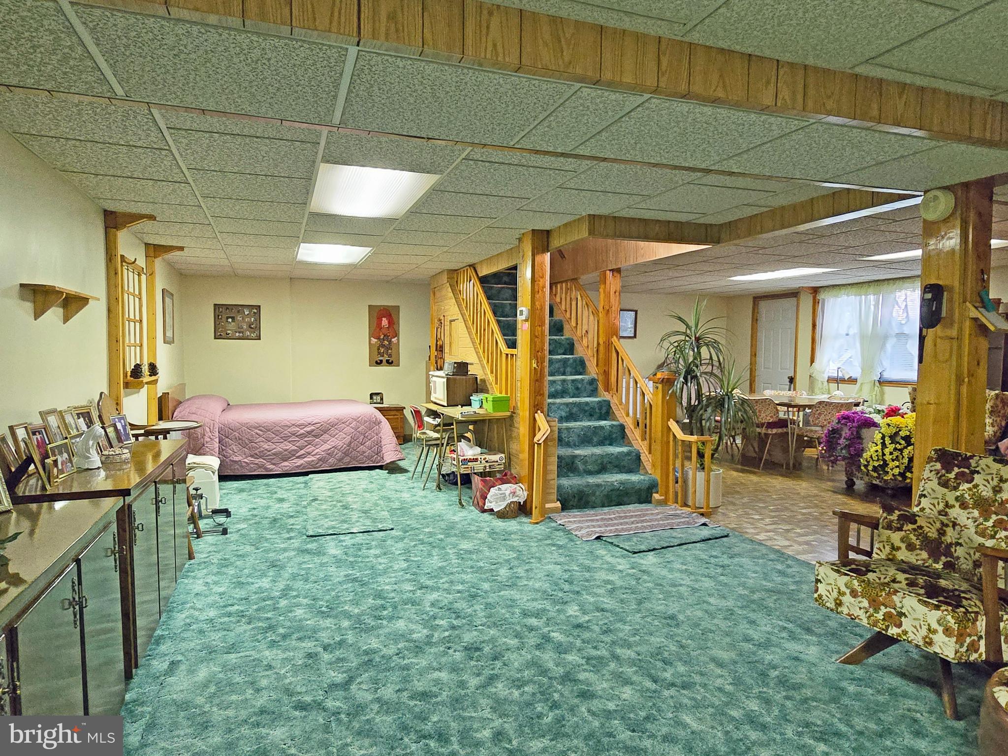 162 Avilton Road Lonaconing, MD 21539 - Photo 27 of 49 a view of a bedroom with furniture and a gym