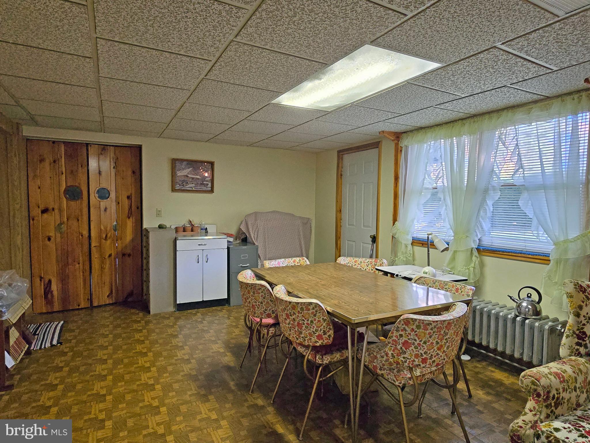 162 Avilton Road Lonaconing, MD 21539 - Photo 30 of 49 a dining room with furniture and window
