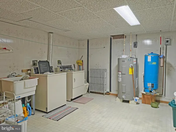 a bathroom with a sink and a shower