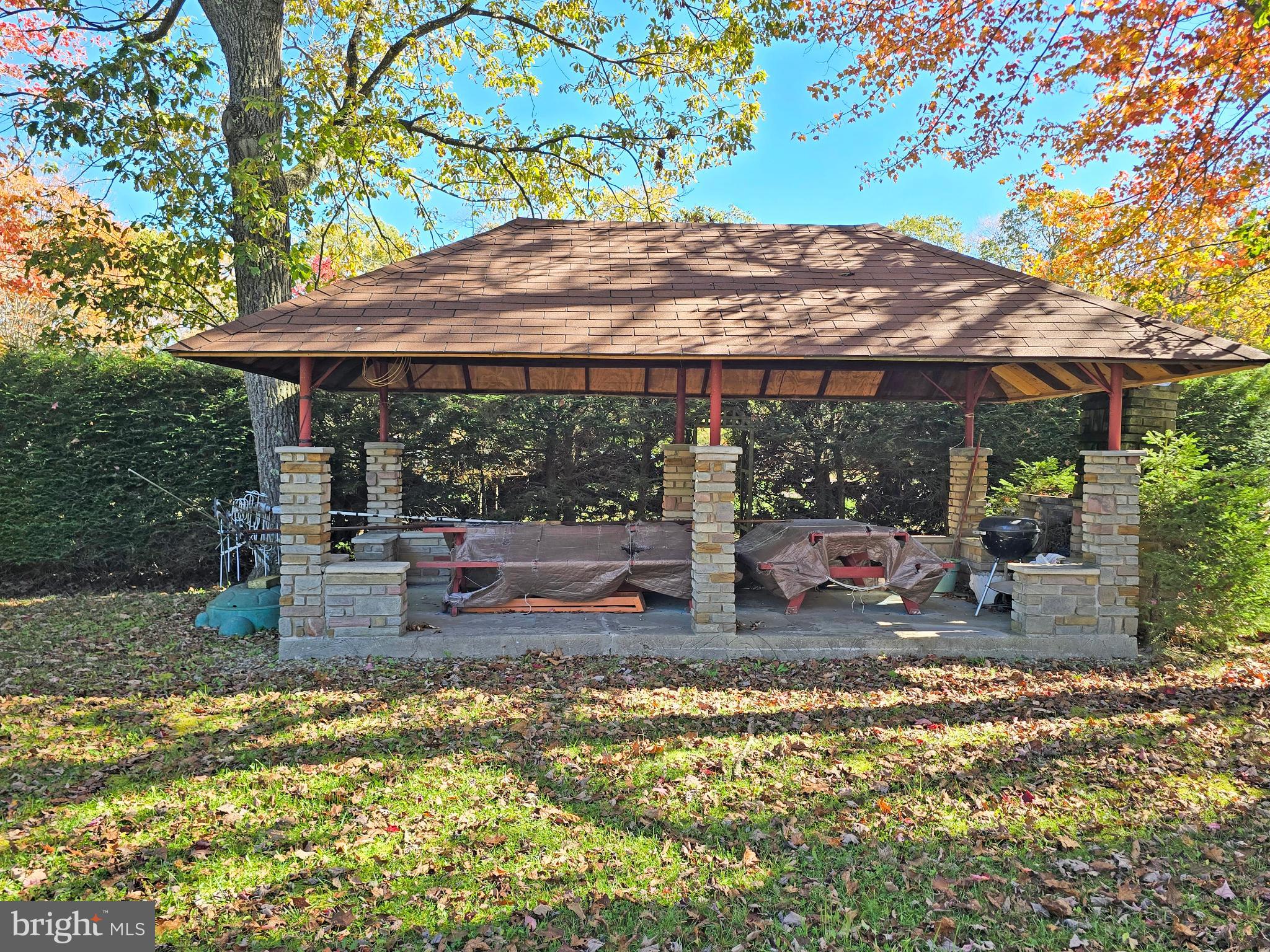 162 Avilton Road Lonaconing, MD 21539 - Photo 42 of 49 a backyard of a house with yard table and chairs