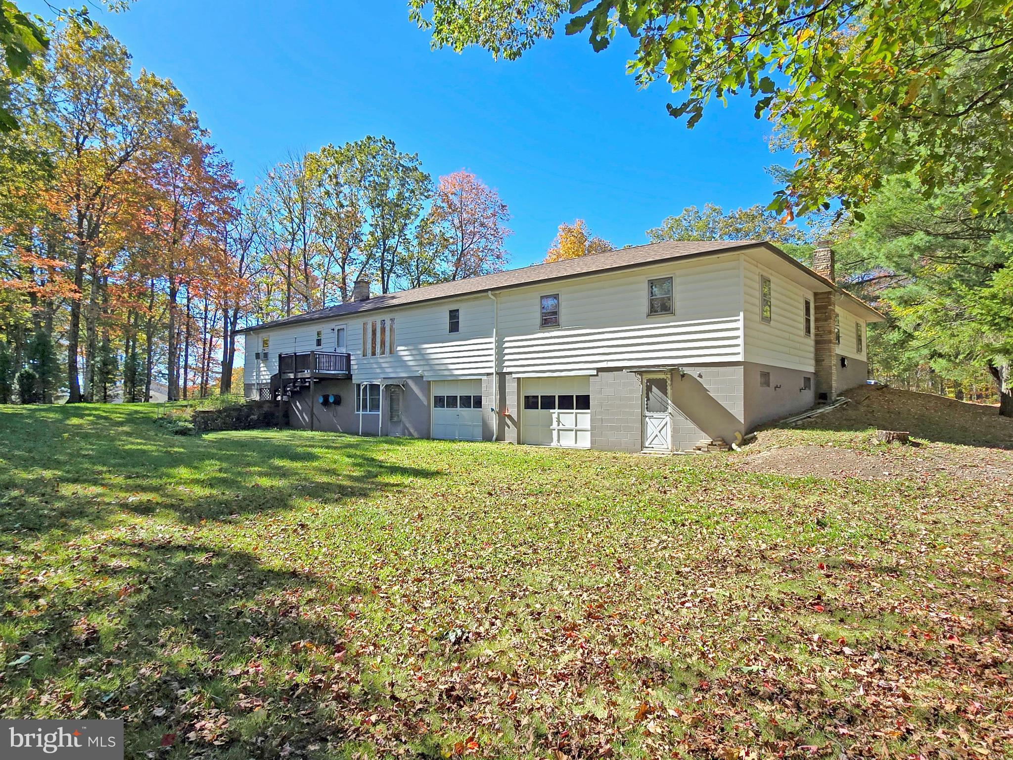 162 Avilton Road Lonaconing, MD 21539 - Photo 45 of 49 a front view of a house with garden