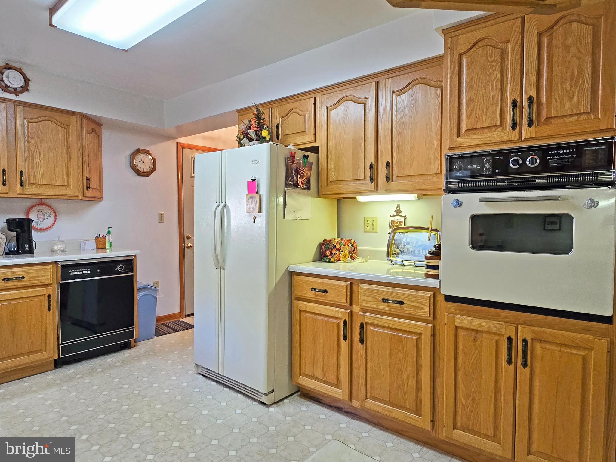 162 Avilton Road Lonaconing, MD 21539 - Photo 7 of 49 a kitchen with stainless steel appliances granite countertop a refrigerator stove and sink