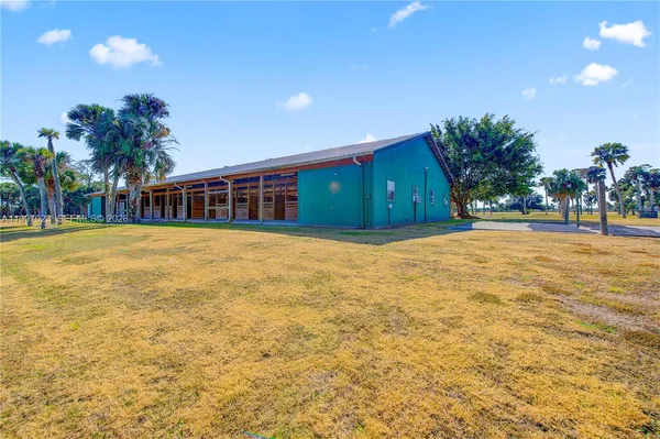 a view of a house with a swimming pool