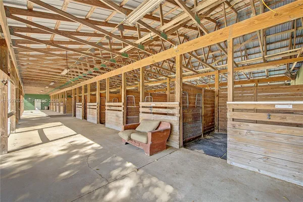 a bedroom with a bed and a table