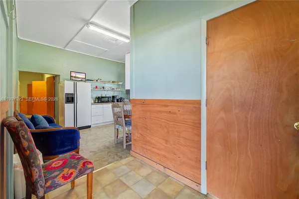 a spacious bathroom with a sink and a mirror