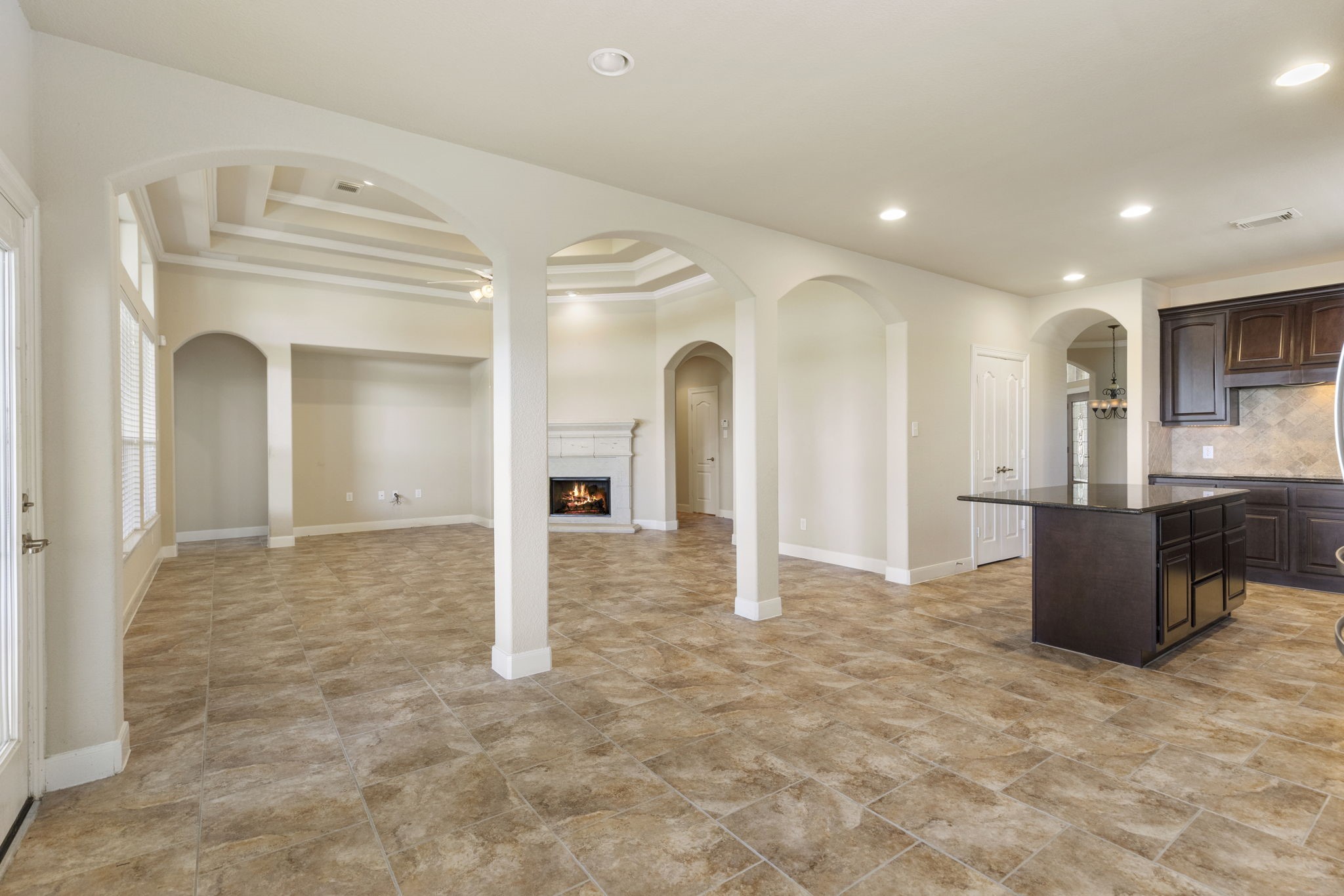 19222 Senterra Lakes Boulevard Spring, TX 77379 - Photo 14 of 45 The open-concept design seamlessly connects the kitchen and casual dining spaces directly to the main family room, making it ideal for entertaining.