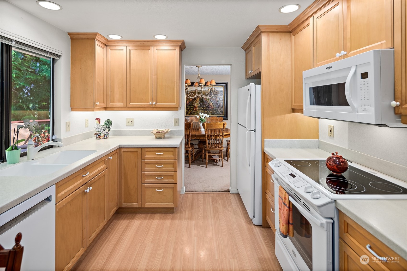 175 Mt Si Place Northwest Issaquah, WA 98027 - Photo 11 of 35 a kitchen with a sink a stove and cabinets
