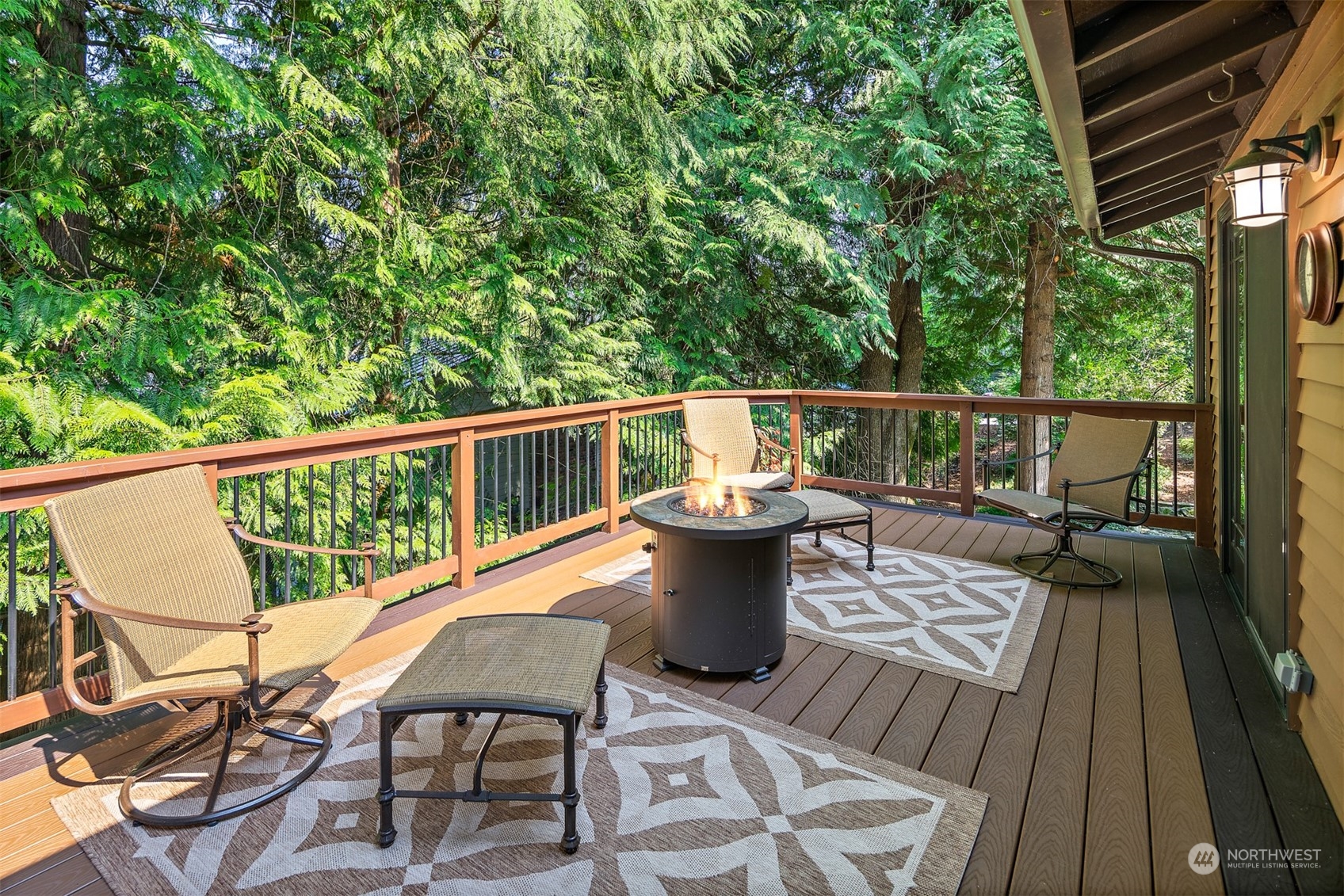 175 Mt Si Place Northwest Issaquah, WA 98027 - Photo 12 of 35 a view of a balcony with wooden floor and outdoor seating