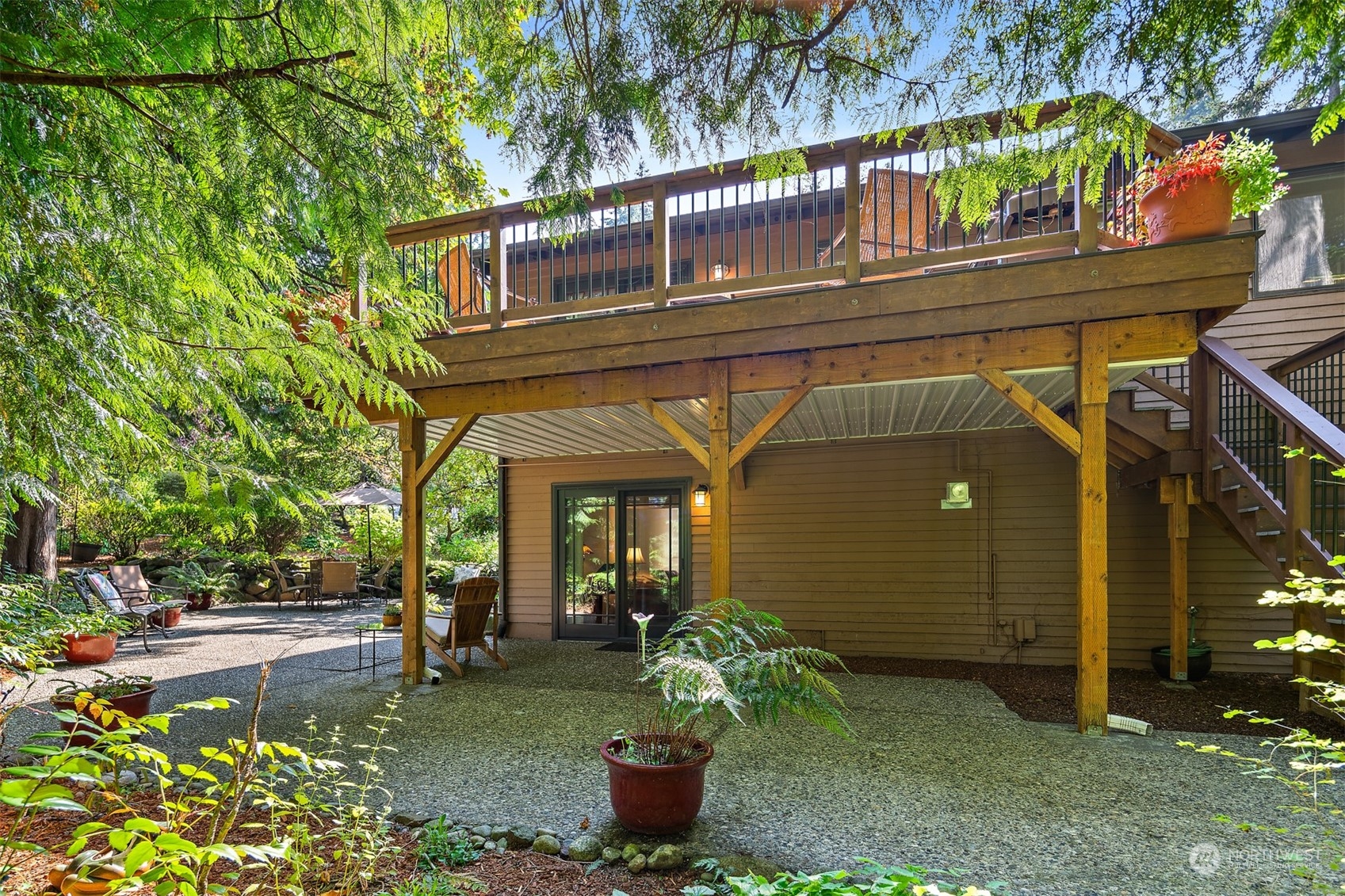 175 Mt Si Place Northwest Issaquah, WA 98027 - Photo 26 of 35 a front view of a house with a garden