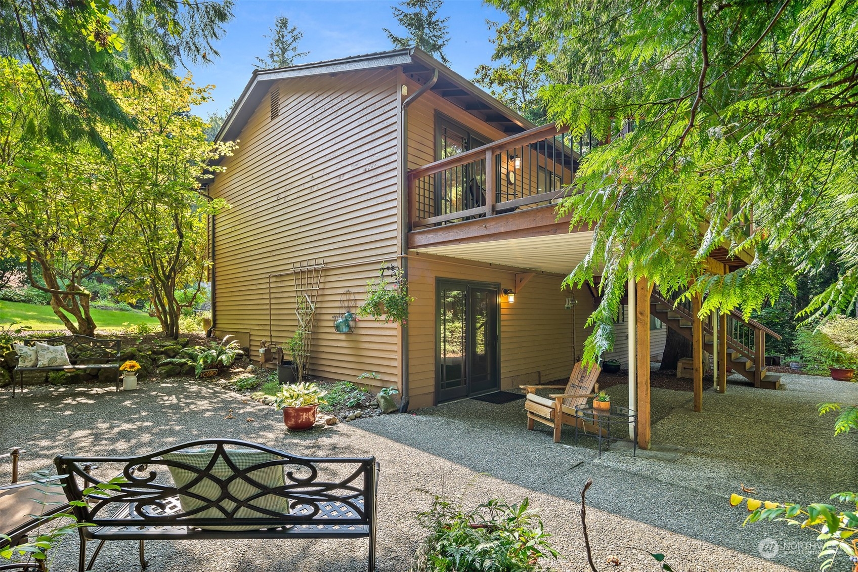 175 Mt Si Place Northwest Issaquah, WA 98027 - Photo 27 of 35 a view of a house with backyard and sitting area