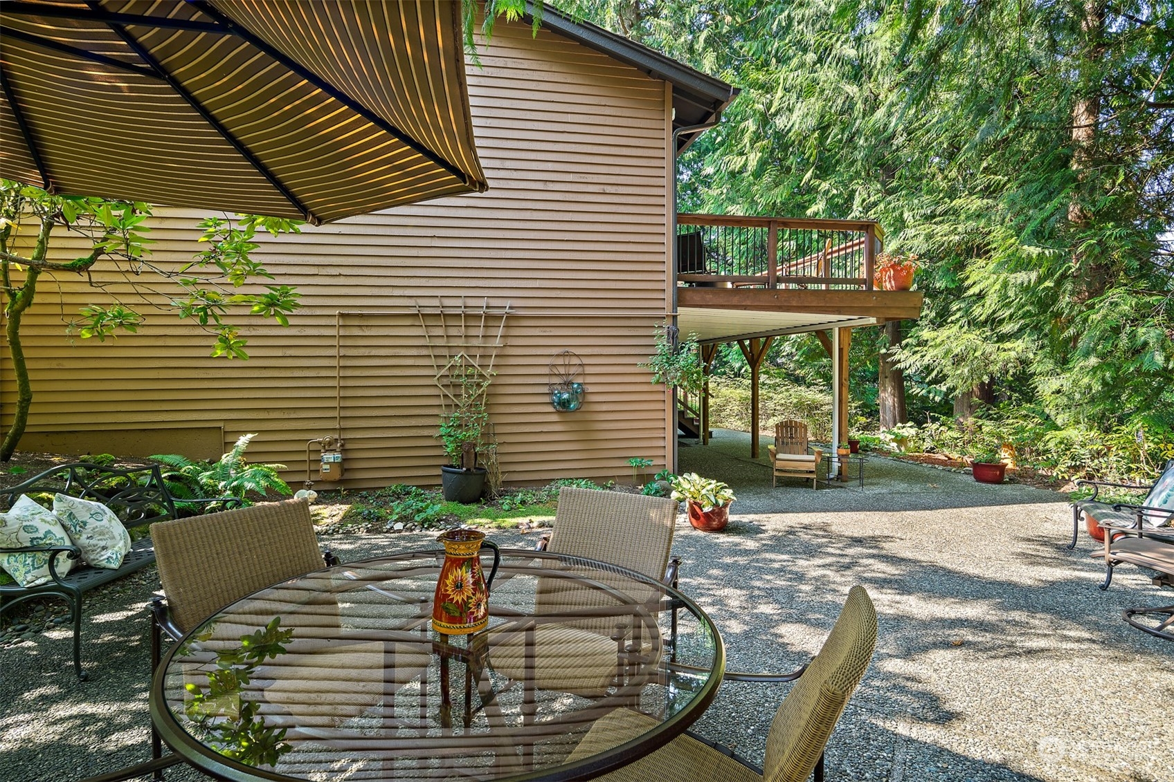 175 Mt Si Place Northwest Issaquah, WA 98027 - Photo 28 of 35 a view of a patio with chairs and table in the patio