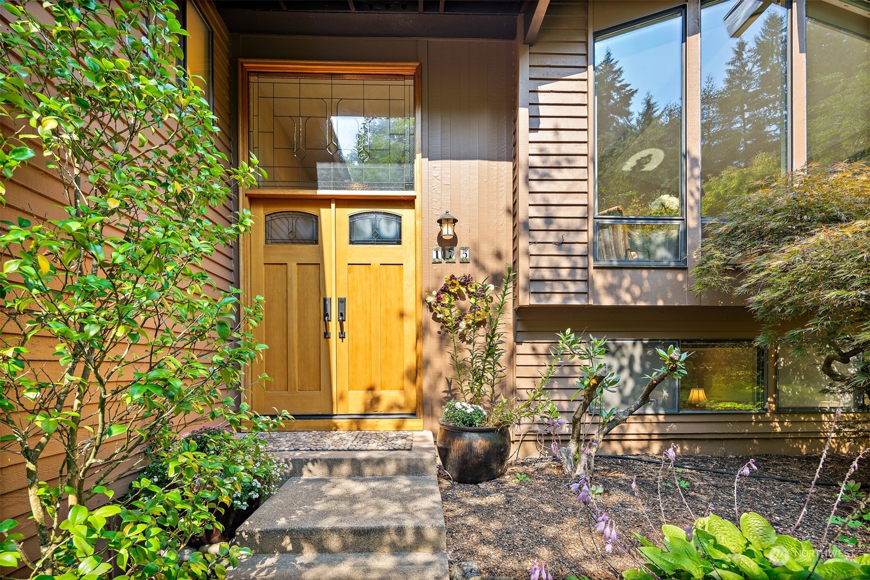 175 Mt Si Place Northwest Issaquah, WA 98027 - Photo 3 of 35 a view of a building with sitting area