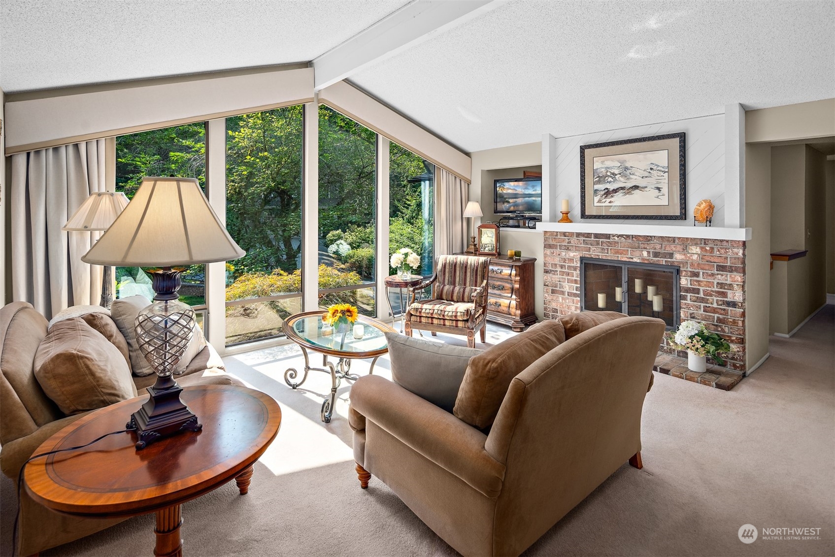 175 Mt Si Place Northwest Issaquah, WA 98027 - Photo 6 of 35 a living room with furniture and a fireplace