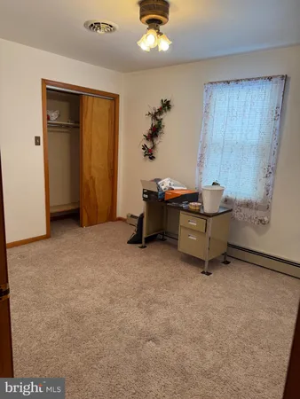 a room with furniture and window