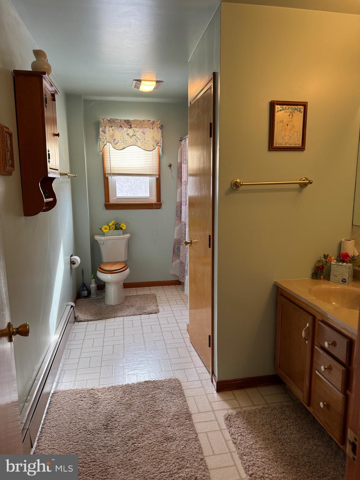 100 North Sandy Hill Road Coatesville, PA 19320 - Photo 15 of 21 a bathroom with a toilet sink and mirror