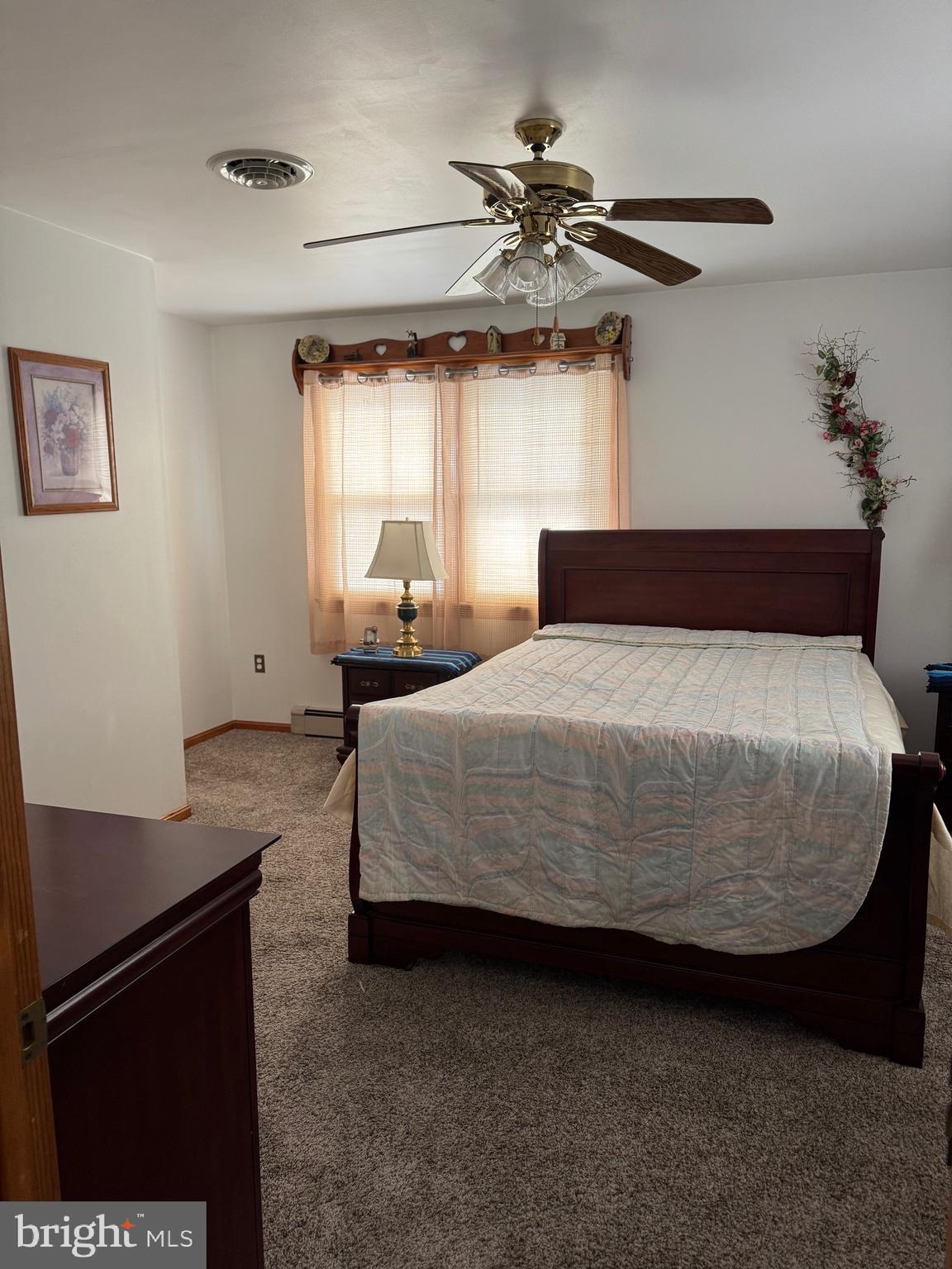 100 North Sandy Hill Road Coatesville, PA 19320 - Photo 4 of 21 a bedroom with a bed and window