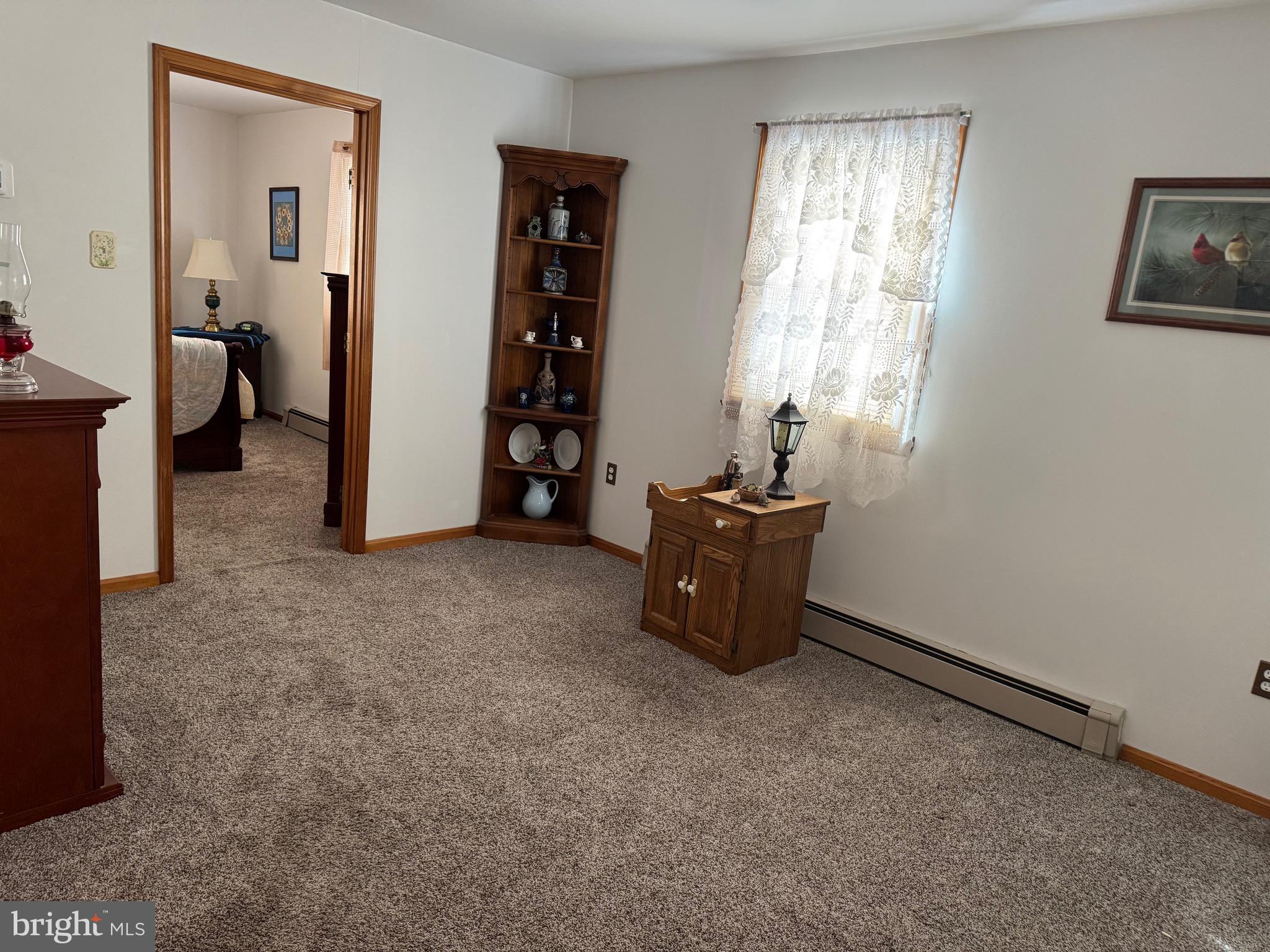 100 North Sandy Hill Road Coatesville, PA 19320 - Photo 6 of 21 a living room with furniture and a window