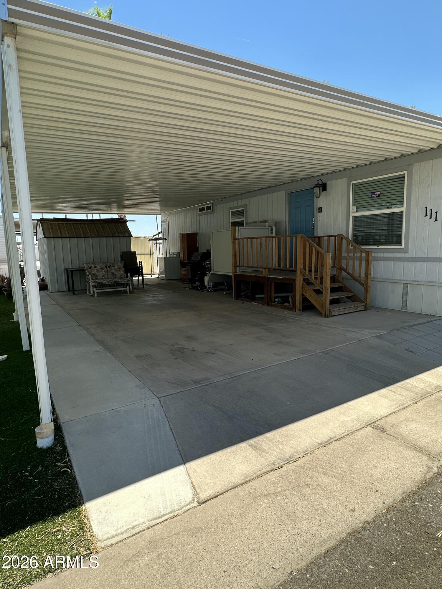 146 North Merrill Road, Unit 111 Apache Junction, AZ 85120 - Photo 5 of 14 a view of a car garage