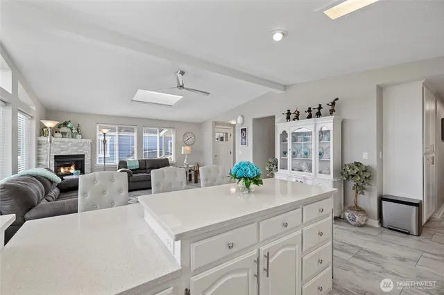 a view of living room with furniture and a chandelier