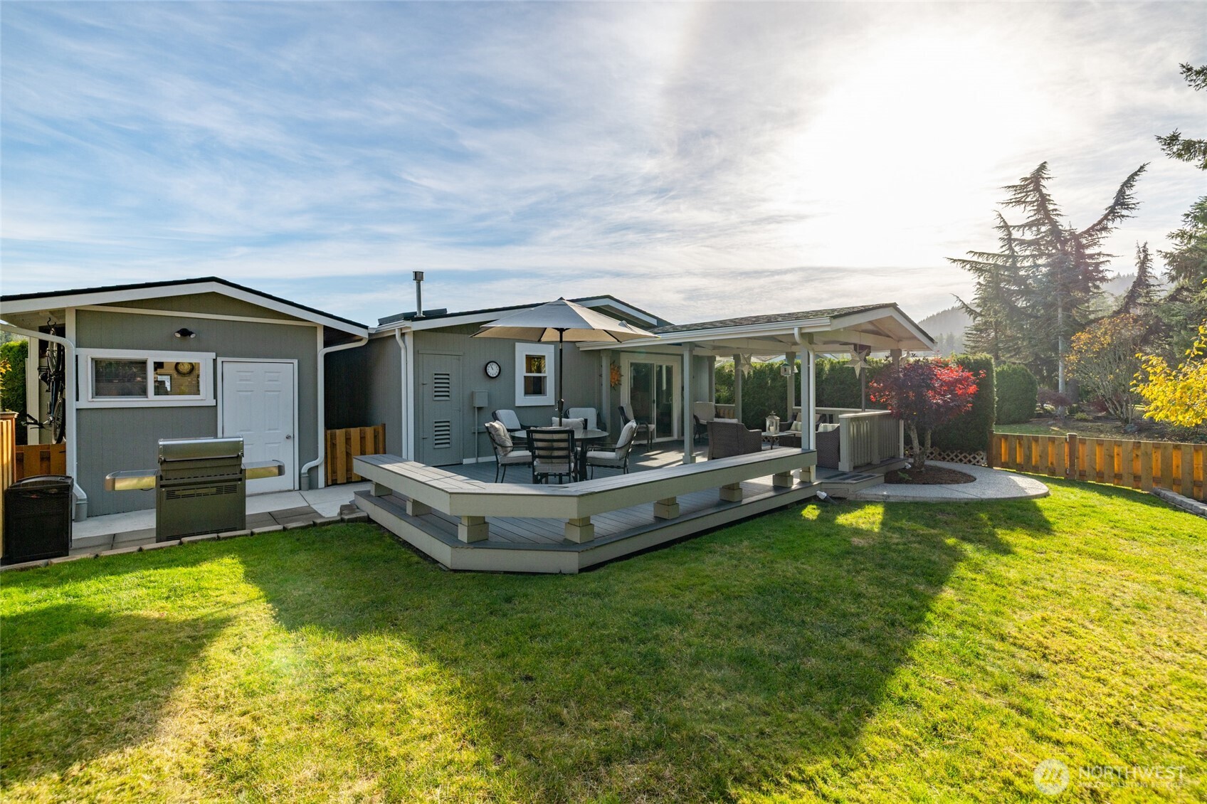 2610 East Section Street, Unit 12 Mount Vernon, WA 98274 - Photo 28 of 39 a view of a house with swimming pool and a yard