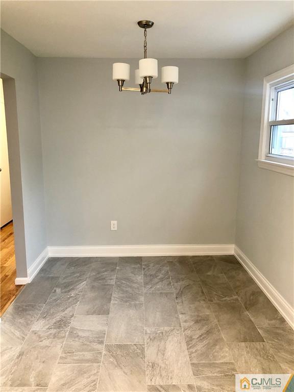 27 Forrest Street Iselin, NJ 08830 - Photo 5 of 12 a view of a room with a window