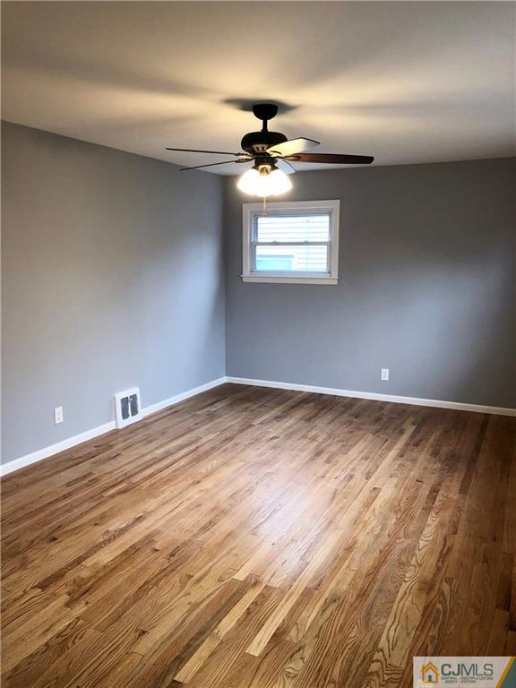 27 Forrest Street Iselin, NJ 08830 - Photo 7 of 12 a view of an empty room